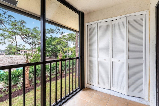 unfurnished sunroom with visible vents