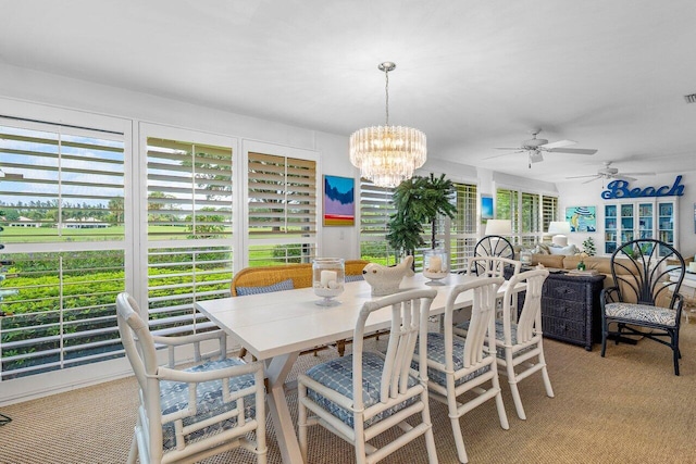 4511 Meadowlark Ln, Boynton Beach, FL 33436 - dining area with light carpet, ceiling fan with notable chandelier, and visible vents