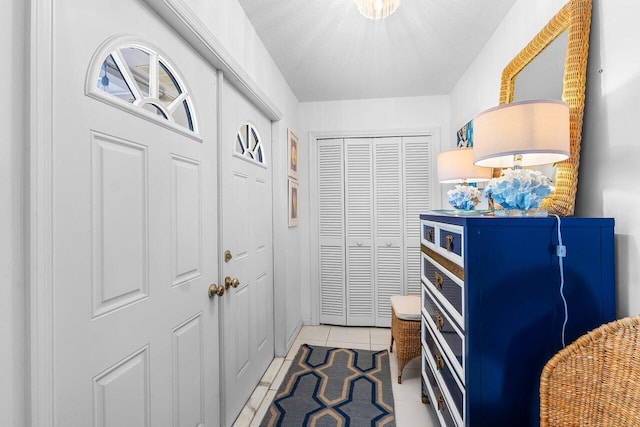 4511 Meadowlark Ln, Boynton Beach, FL 33436 - entryway featuring a textured ceiling and light tile patterned floors