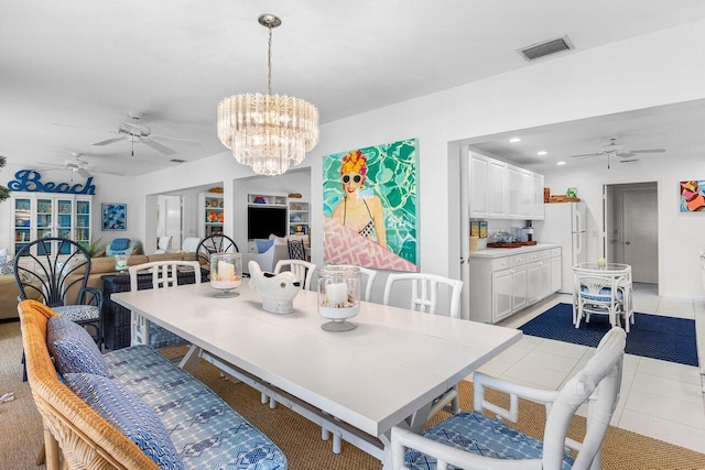4511 Meadowlark Ln, Boynton Beach, FL 33436 - dining room featuring light tile patterned floors, ceiling fan with notable chandelier, visible vents, built in features, and recessed lighting