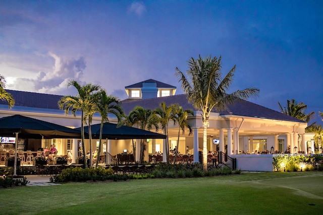 4511 Meadowlark Ln, Boynton Beach, FL 33436 - rear view of house featuring a yard