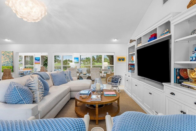 4511 Meadowlark Ln, Boynton Beach, FL 33436 - living area with lofted ceiling, visible vents, and built in shelves