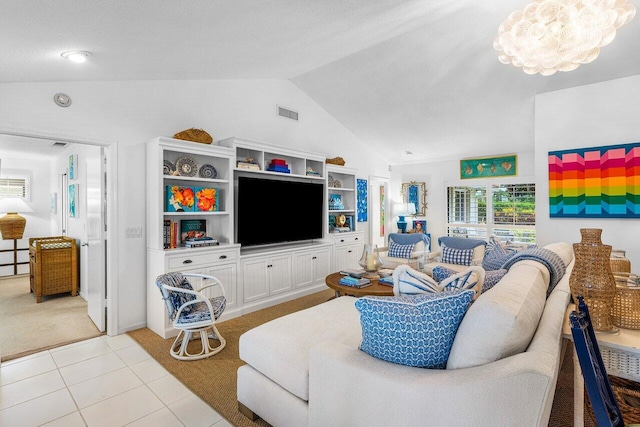 4511 Meadowlark Ln, Boynton Beach, FL 33436 - living room with lofted ceiling, light tile patterned floors, visible vents, and light colored carpet