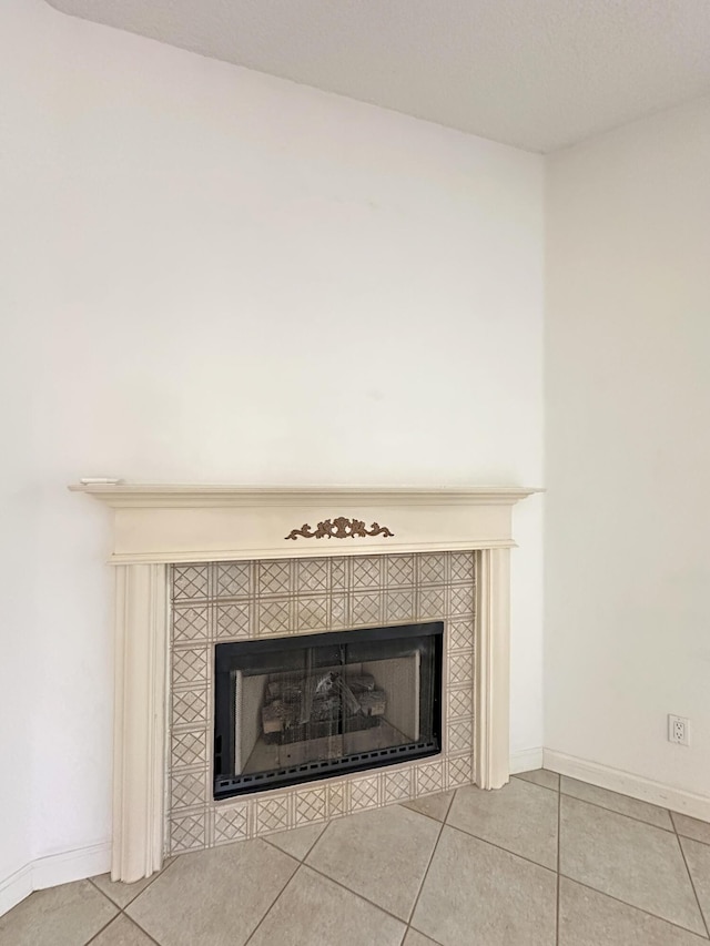 573 SW Saint Kitts St, Port Saint Lucie, FL 34953 - detailed view of a tiled fireplace and baseboards
