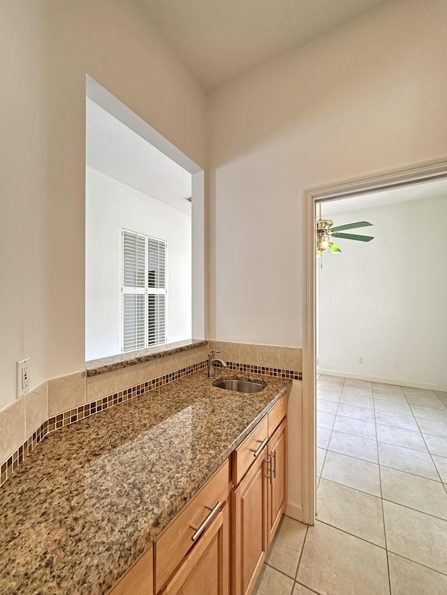 573 SW Saint Kitts St, Port Saint Lucie, FL 34953 - bathroom with a sink and tile patterned flooring