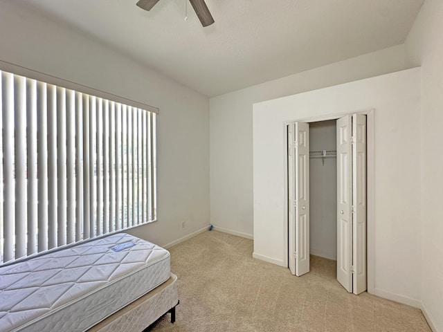 573 SW Saint Kitts St, Port Saint Lucie, FL 34953 - carpeted bedroom with a closet and ceiling fan