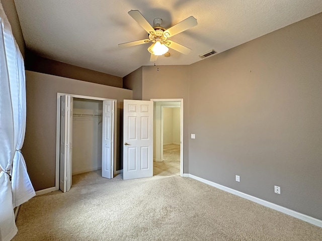 573 SW Saint Kitts St, Port Saint Lucie, FL 34953 - unfurnished bedroom featuring light carpet, a closet, and ceiling fan