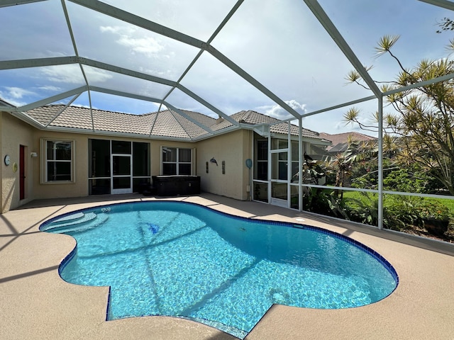 573 SW Saint Kitts St, Port Saint Lucie, FL 34953 - outdoor pool with a patio area and glass enclosure