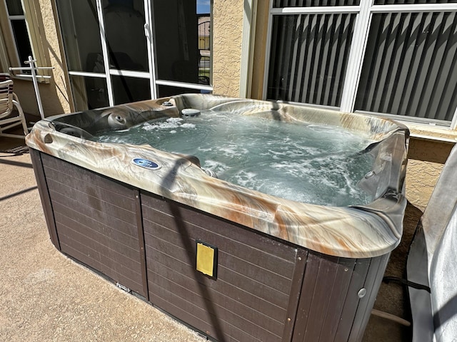 573 SW Saint Kitts St, Port Saint Lucie, FL 34953 - view of patio / terrace with a hot tub