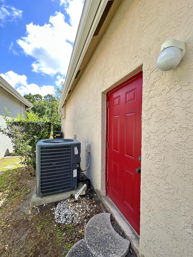 573 SW Saint Kitts St, Port Saint Lucie, FL 34953 - doorway to property featuring stucco siding