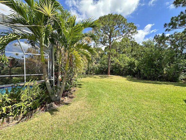 573 SW Saint Kitts St, Port Saint Lucie, FL 34953 - view of green lawn