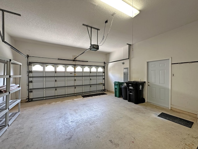 573 SW Saint Kitts St, Port Saint Lucie, FL 34953 - garage featuring a garage door opener