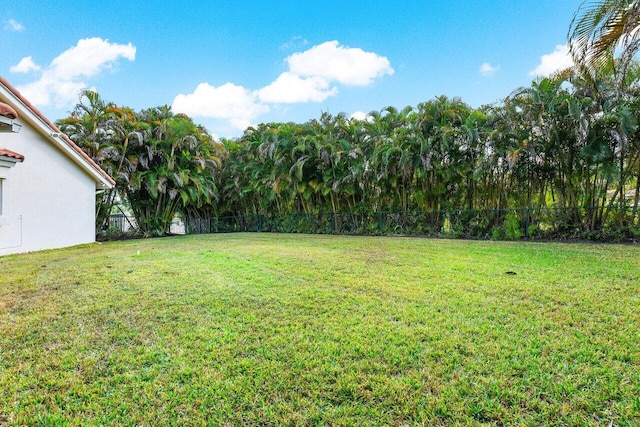 view of yard with fence