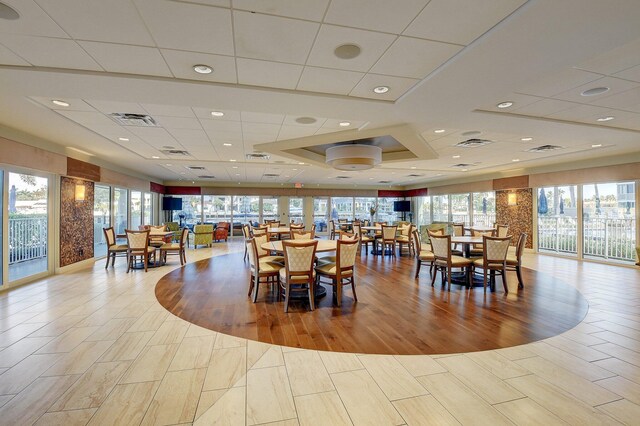 3212 S Ocean Blvd Unit 404-A, Highland Beach, FL 33487 - dining room with a paneled ceiling