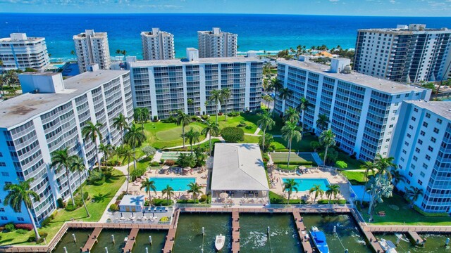 3212 S Ocean Blvd Unit 404-A, Highland Beach, FL 33487 - aerial view of a pool area, a nearby body of water, and apartment complex / building