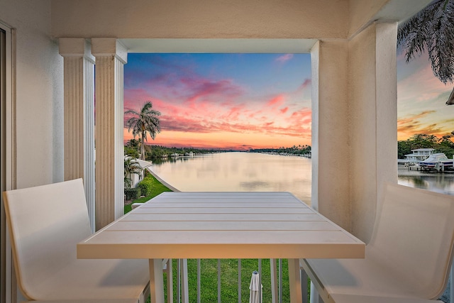 exterior space with a water view