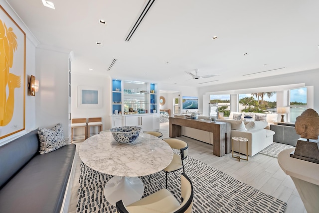 dining room featuring recessed lighting and light wood finished floors