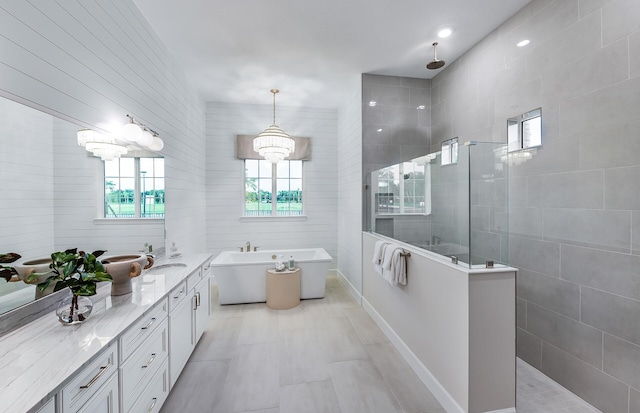 20128 Se Bridgewater Drive Oakley Model, Jupiter, FL 33458 - bathroom with a freestanding bath, vanity, and walk in shower
