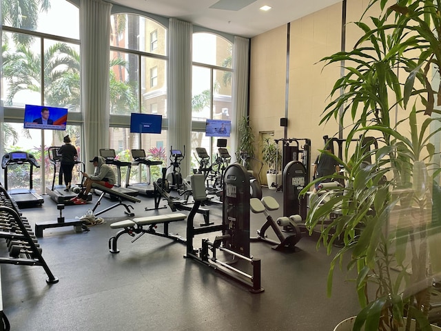 workout area featuring expansive windows