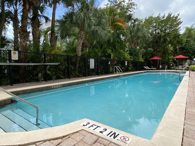 pool featuring fence