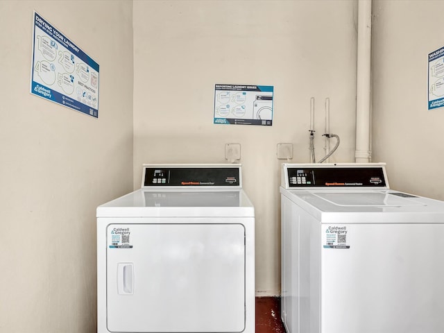 614 NW 13th St Unit 27, Boca Raton, FL 33486 - shared laundry area with washing machine and dryer