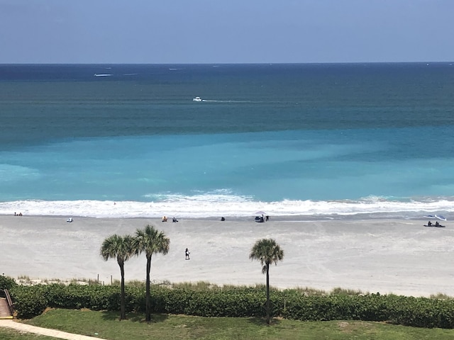 property view of water featuring a beach view