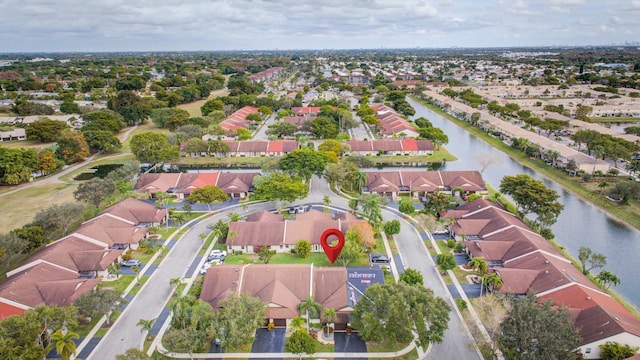 aerial view featuring a residential view and a water view