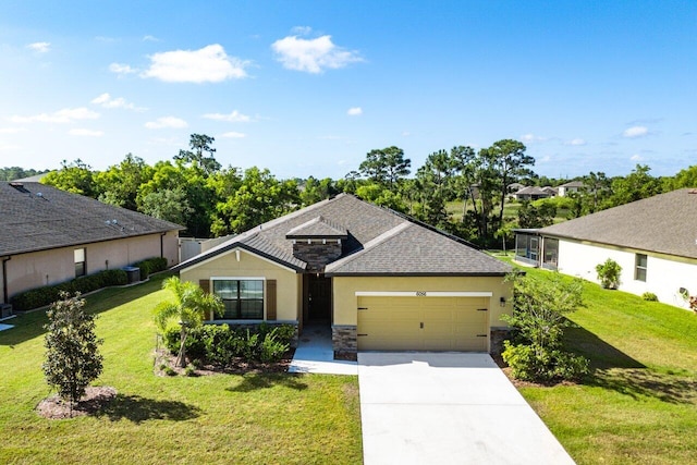 6056 NW Regent St, Port Saint Lucie, FL 34983 - view of front of property featuring driveway, a garage, a front lawn, stone siding, and stucco siding