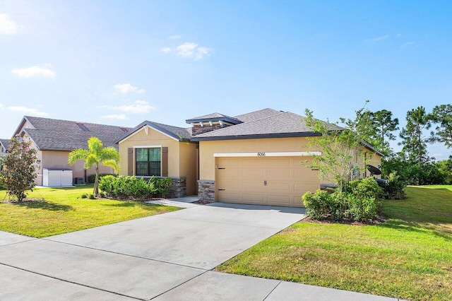 6056 NW Regent St, Port Saint Lucie, FL 34983 - view of front of property with stone siding, a front yard, stucco siding, concrete driveway, and an attached garage