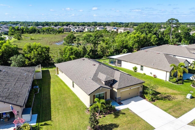 6056 NW Regent St, Port Saint Lucie, FL 34983 - aerial view featuring a residential view