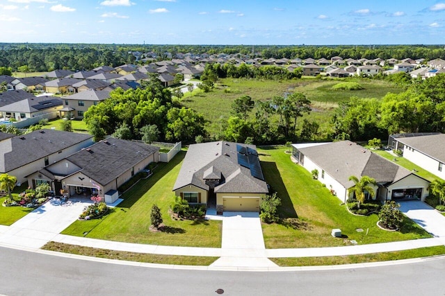 6056 NW Regent St, Port Saint Lucie, FL 34983 - birds eye view of property with a residential view