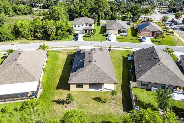 6056 NW Regent St, Port Saint Lucie, FL 34983 - drone / aerial view featuring a residential view
