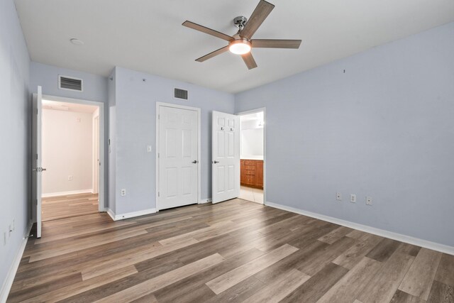 6565 Emerald Dunes Dr Unit 108, West Palm Beach, FL 33411 - view of sport court with fence