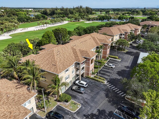 6565 Emerald Dunes Dr Unit 108, West Palm Beach, FL 33411 - bird's eye view featuring view of golf course and a water view