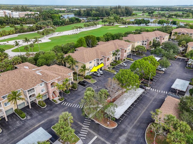 6565 Emerald Dunes Dr Unit 108, West Palm Beach, FL 33411 - drone / aerial view featuring a water view and golf course view