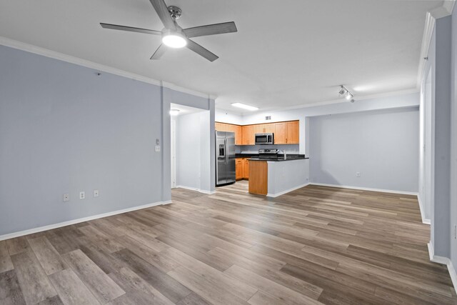 6565 Emerald Dunes Dr Unit 108, West Palm Beach, FL 33411 - unfurnished room featuring baseboards, a ceiling fan, and dark wood-style flooring