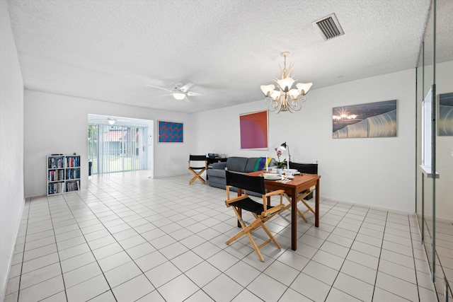208 Cape Cod Cir, Lake Worth, FL 33467 - dining room featuring a textured ceiling, a chandelier, light tile patterned floors, and a ceiling fan