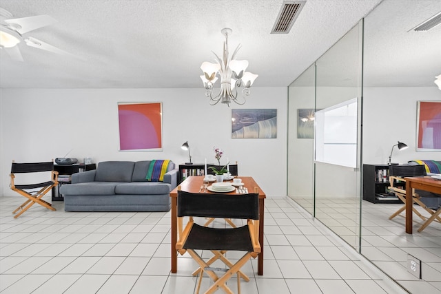 208 Cape Cod Cir, Lake Worth, FL 33467 - living area featuring a textured ceiling, a chandelier, and light tile patterned floors