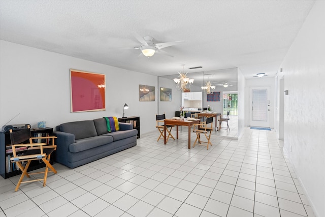 208 Cape Cod Cir, Lake Worth, FL 33467 - living area with a chandelier, ceiling fan, light tile patterned floors, and a textured ceiling