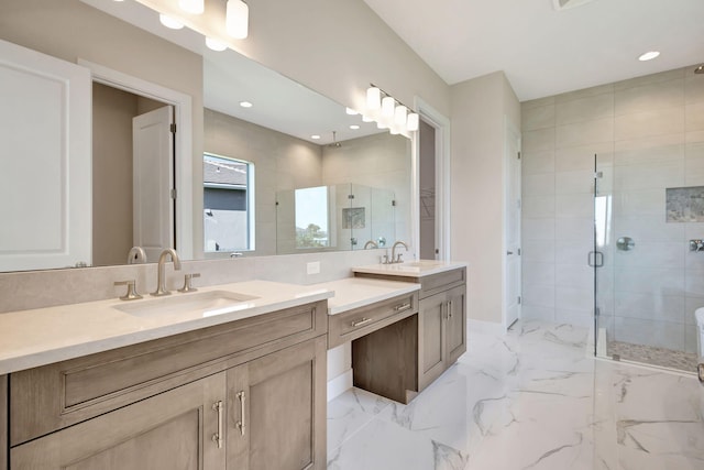 bathroom featuring vanity, a shower stall, recessed lighting, and marble finish floor