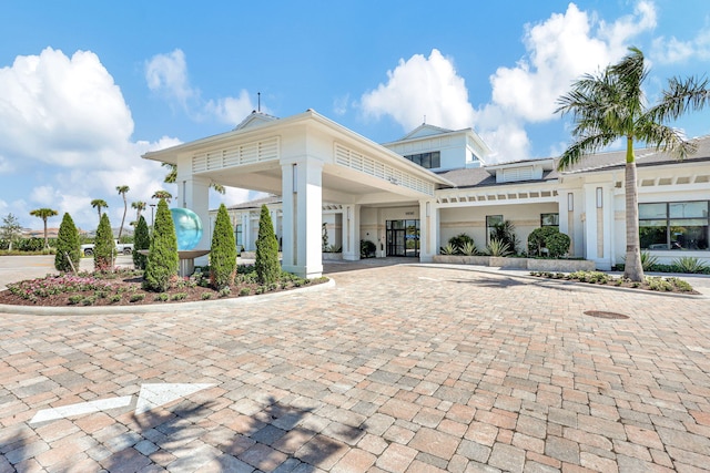exterior space with decorative driveway