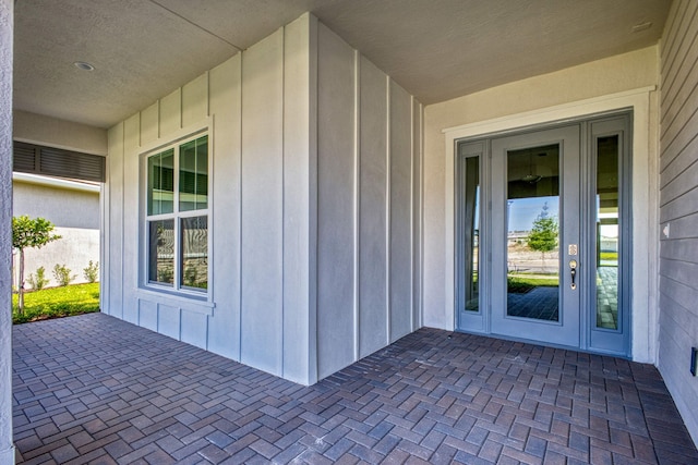 property entrance with board and batten siding