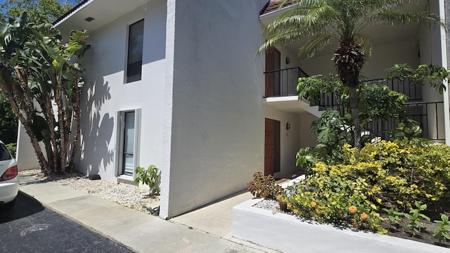 1823 Embassy Dr Unit 101, West Palm Beach, FL 33401 - view of property exterior featuring stucco siding