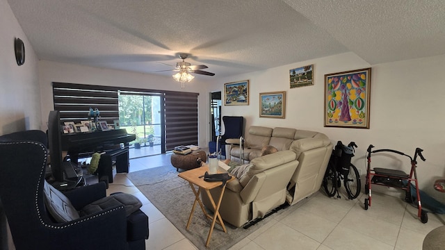 1823 Embassy Dr Unit 101, West Palm Beach, FL 33401 - living room featuring a textured ceiling, ceiling fan, and light tile patterned floors