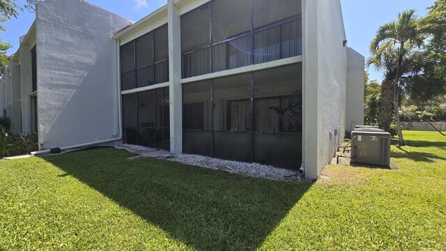 1823 Embassy Dr Unit 101, West Palm Beach, FL 33401 - view of outdoor structure featuring central AC