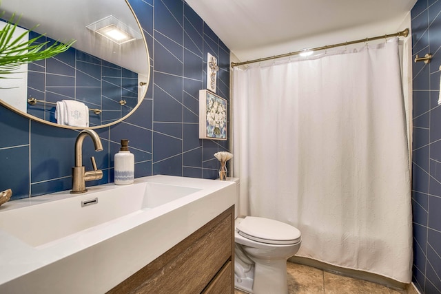 kitchen featuring light stone countertops, recessed lighting, baseboards, white appliances, and a sink
