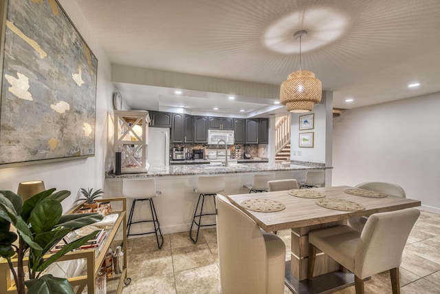 living area with wood ceiling, visible vents, baseboards, ceiling fan, and recessed lighting