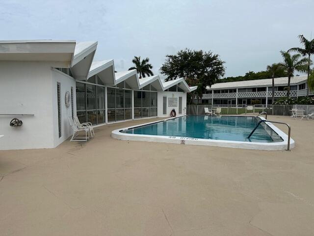 331 Tequesta Dr Unit 212, Tequesta, FL 33469 - community pool featuring a patio area