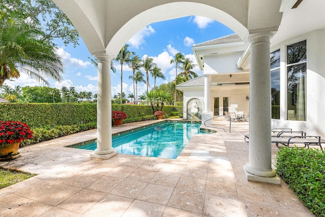 16330 Vintage Oaks Ln, Delray Beach, FL 33484 - view of swimming pool with french doors, a patio, and a fenced backyard