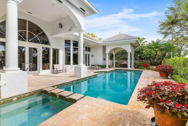 16330 Vintage Oaks Ln, Delray Beach, FL 33484 - view of pool with french doors, a patio area, fence, and a pool with connected hot tub
